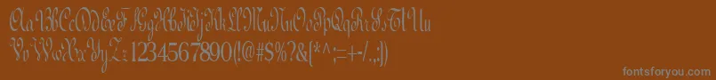 フォントBedRegular – 茶色の背景に灰色の文字