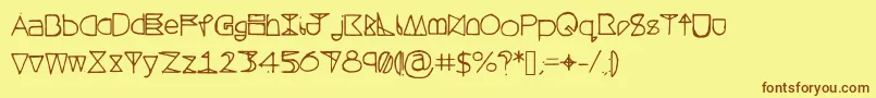 Saiba mais sobre a fonte Questrahollow Fonte Questrahollow – fontes marrons em um fundo amarelo