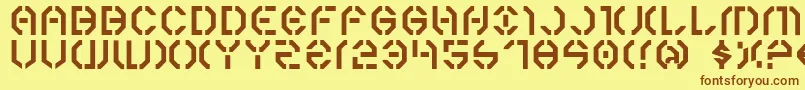 フォントY3k – 茶色の文字が黄色の背景にあります。