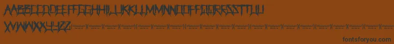 Więcej informacji o czcionce ThegrinderRegular Czcionka ThegrinderRegular – czarne czcionki na brązowym tle