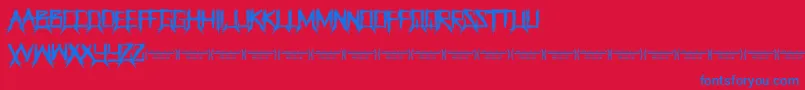 ThegrinderRegular Font – Blue Fonts on Red Background