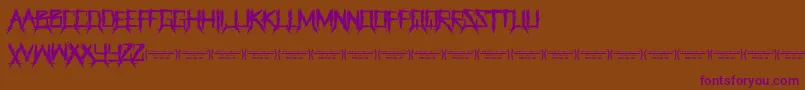 ThegrinderRegular Font – Purple Fonts on Brown Background