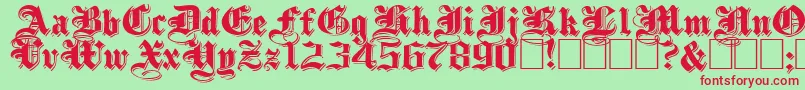 ShadowedBlackWide-Schriftart – Rote Schriften auf grünem Hintergrund