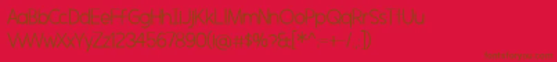 MorningtypeLight-Schriftart – Braune Schriften auf rotem Hintergrund
