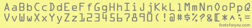 フォントOcraLtAlternate – 黄色の背景に灰色の文字