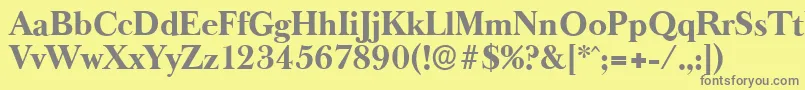 フォントBaskeroldserialXboldRegular – 黄色の背景に灰色の文字