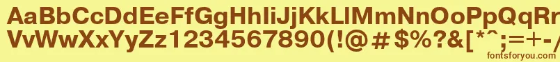 フォントUkrainianpragmaticaBold – 茶色の文字が黄色の背景にあります。