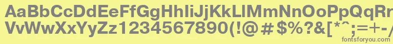 UkrainianpragmaticaBold-fontti – harmaat kirjasimet keltaisella taustalla