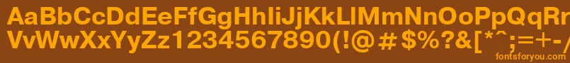 フォントUkrainianpragmaticaBold – オレンジ色の文字が茶色の背景にあります。