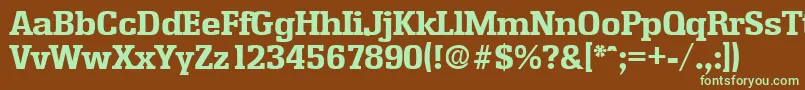 フォントEnschedeBold – 緑色の文字が茶色の背景にあります。