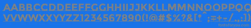 フォントMontserratsubrayadaBold – 青い背景に灰色の文字