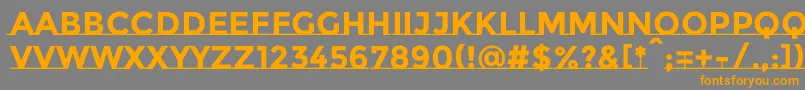 フォントMontserratsubrayadaBold – オレンジの文字は灰色の背景にあります。