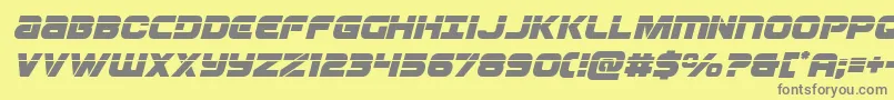 フォントOzdalaserital – 黄色の背景に灰色の文字