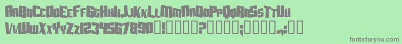 フォントAftershockDebrisCondsolid – 緑の背景に灰色の文字