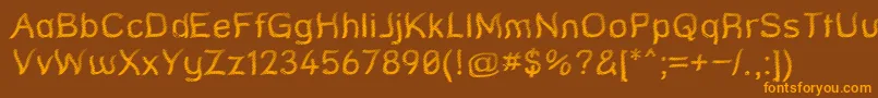 Więcej informacji o czcionce StreetQuaked Czcionka StreetQuaked – pomarańczowe czcionki na brązowym tle