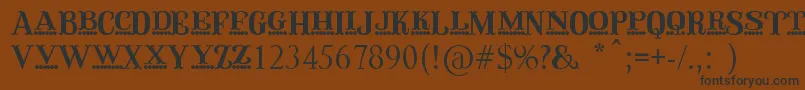 QirkusCaps Font – Black Fonts on Brown Background