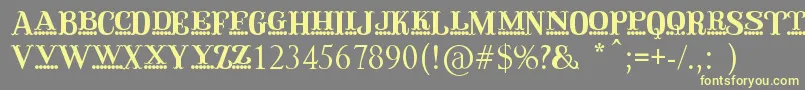 QirkusCaps Font – Yellow Fonts on Gray Background