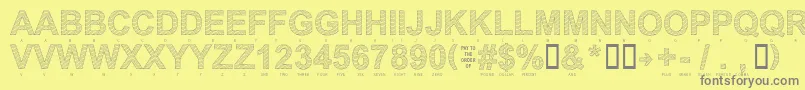 Fonte Secure22a – fontes cinzas em um fundo amarelo