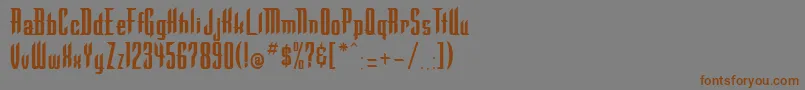 フォントWarlockRegular – 茶色の文字が灰色の背景にあります。