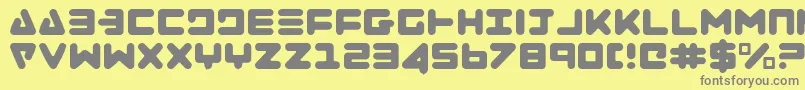 フォントZealotl – 黄色の背景に灰色の文字