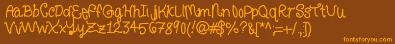 Curlyletters Font – Orange Fonts on Brown Background