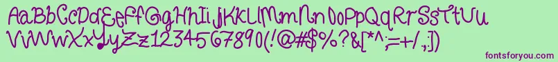 Curlyletters Font – Purple Fonts on Green Background