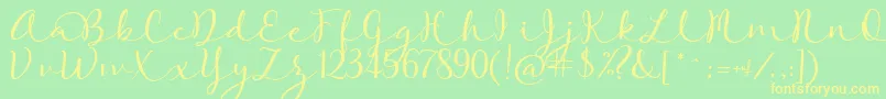 フォントRoseOfBaltimore – 黄色の文字が緑の背景にあります