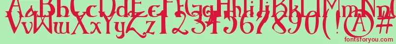 ElementaryGothicBookhand Font – Red Fonts on Green Background