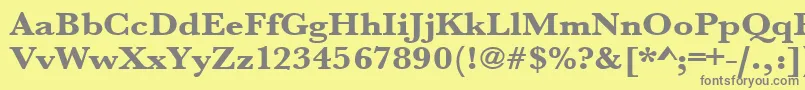 フォントUrwbaskertextbolextwid – 黄色の背景に灰色の文字