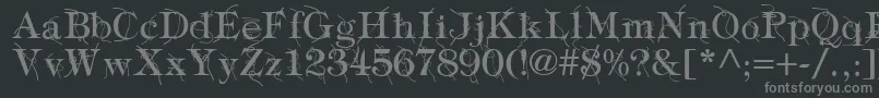 フォントTypographyTiesRegular – 黒い背景に灰色の文字