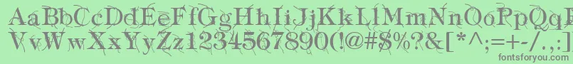 フォントTypographyTiesRegular – 緑の背景に灰色の文字