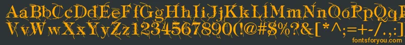 フォントTypographyTiesRegular – 黒い背景にオレンジの文字