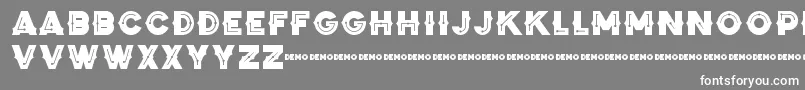 Czcionka ZilapBlackStormDemo – białe czcionki na szarym tle