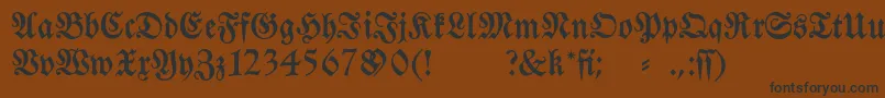 Fraktura-fontti – mustat fontit ruskealla taustalla