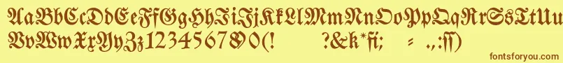 フォントFraktura – 茶色の文字が黄色の背景にあります。