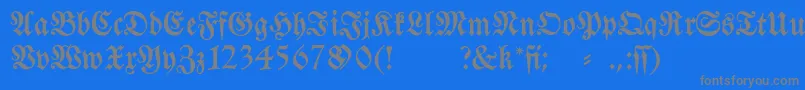 Fraktura-fontti – harmaat kirjasimet sinisellä taustalla
