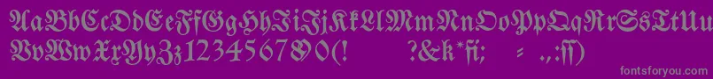 Fraktura-fontti – harmaat kirjasimet violetilla taustalla