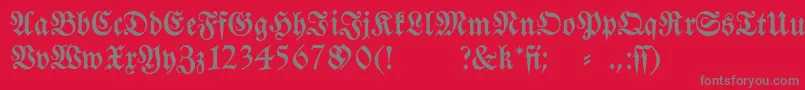 Fraktura-Schriftart – Graue Schriften auf rotem Hintergrund