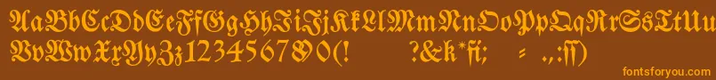Fraktura-fontti – oranssit fontit ruskealla taustalla