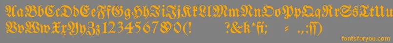 Fraktura-fontti – oranssit fontit harmaalla taustalla