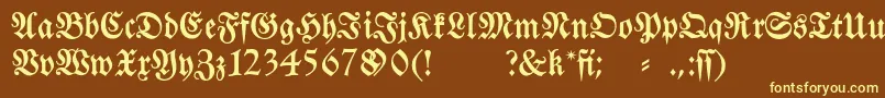 Fraktura-fontti – keltaiset fontit ruskealla taustalla
