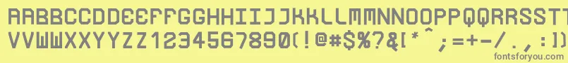 フォントLoucoRegularRicardocarvalho – 黄色の背景に灰色の文字