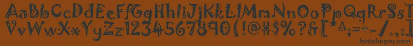 Jokerman Font – Black Fonts on Brown Background