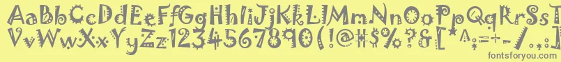 フォントJokerman – 黄色の背景に灰色の文字