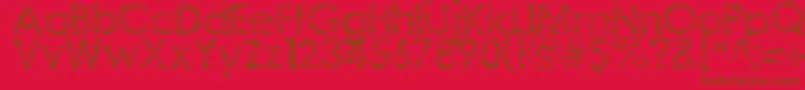 Staccatissmo-Schriftart – Braune Schriften auf rotem Hintergrund