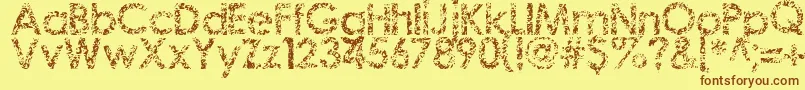Staccatissmo-Schriftart – Braune Schriften auf gelbem Hintergrund