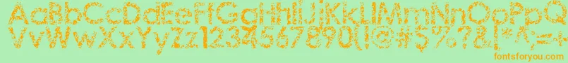 Staccatissmo-Schriftart – Orangefarbene Schriften auf grünem Hintergrund