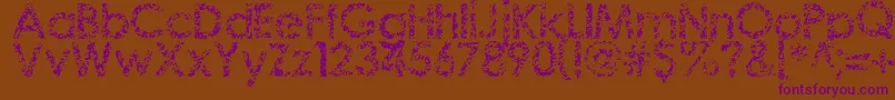 Staccatissmo Font – Purple Fonts on Brown Background