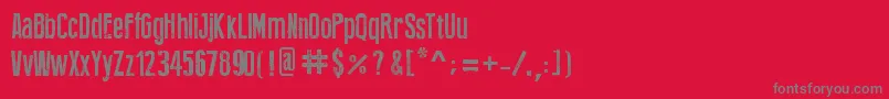 フォントPressFeelingEroded – 赤い背景に灰色の文字