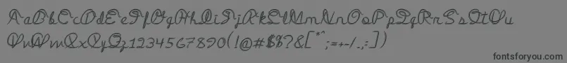 フォントMedleyScript – 黒い文字の灰色の背景